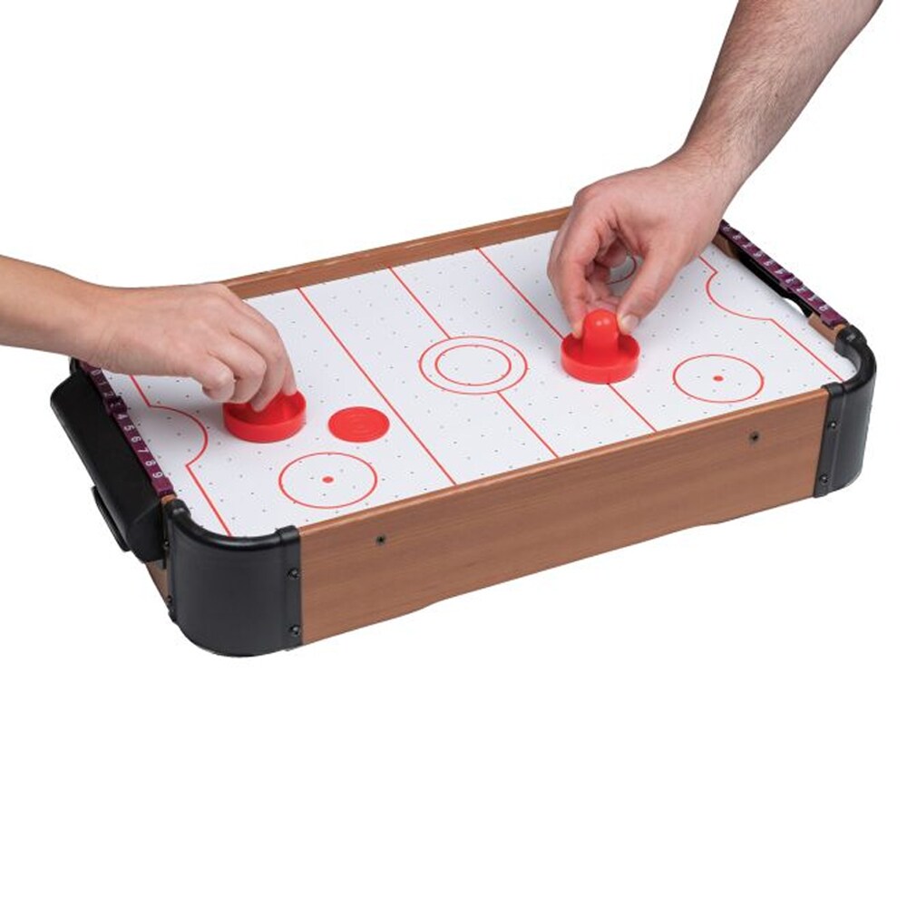 Air Hockey bords­spel där två spelare använder pushers och svävande puck