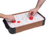 Air Hockey bords­spel där två spelare använder pushers och svävande puck